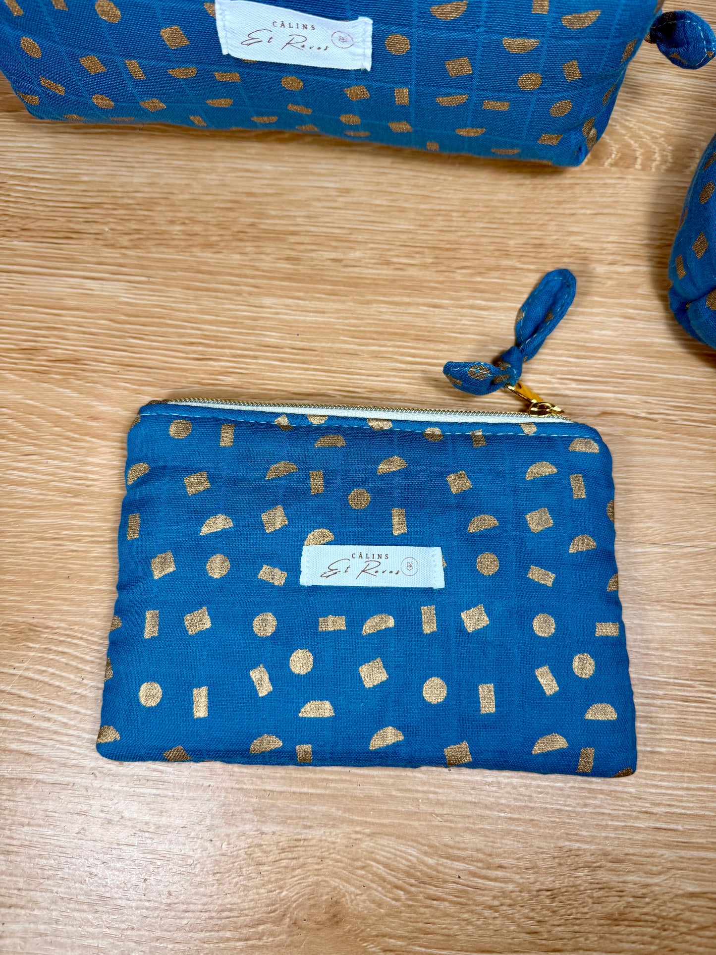 calins et reves petite pochette bleu et or